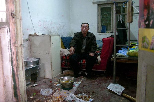 Een Chinese migrant-arbeider in Peking
