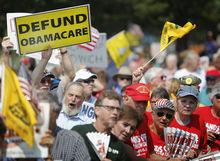 Tea Party-aanhangers protesteren tegen Obamacare.