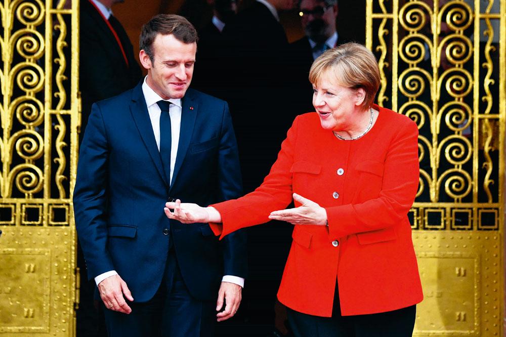 Merkel en Macron. 'Zijn verkiezing was voor haar een grote opluchting.'