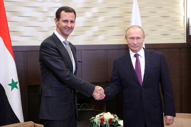 Bashar Al-Assad en Vladimir Poetin.