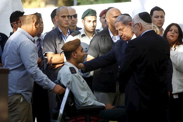 Israëlisch premier Benjamin Netanyahu tijdens een herdenking van de Israëlische slachtoffers van operatie 'Protective Edge' dat een jaar eerder in de Gazastrook gelanceerd werd.