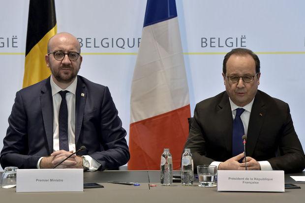 Le premier ministre belge Charles Michel et le président français François Hollande