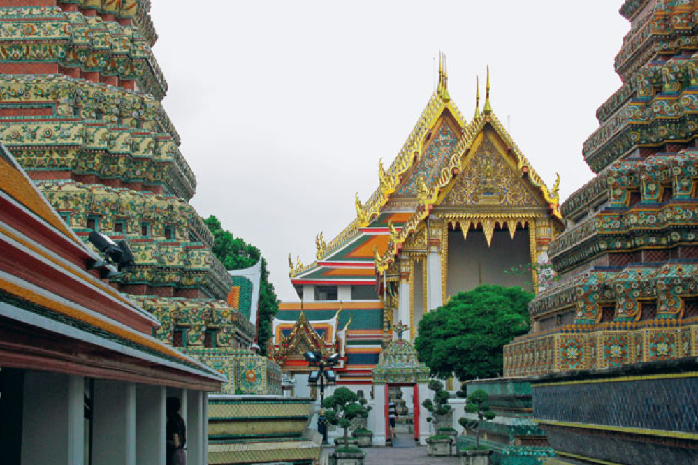 Het tempelcomplex van Wat Pho, toeristische bezienswaardigheid én oord van bezinning.