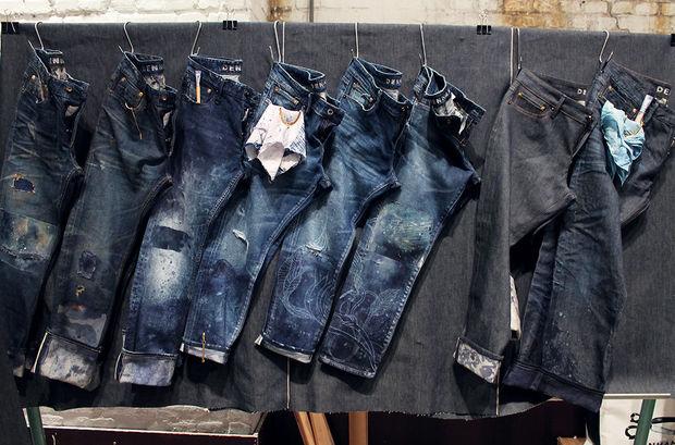 Acht jeans van Denham werden door denimkunstenaars Juan en Laura bewerkt.