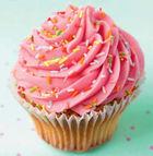Cupcake met roze suikerrozet