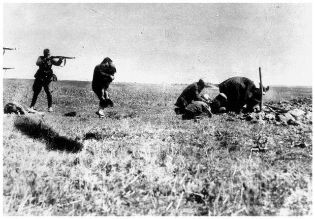 Photograph of the execution of Kiev Jews by a German army mobile killing unit, 1942. 