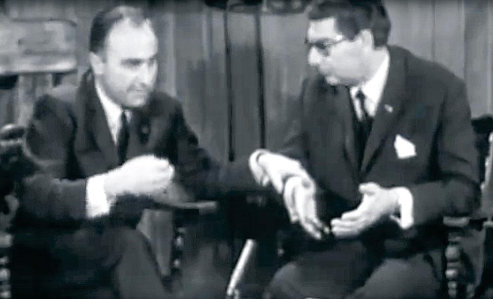 Grand moment télévisé d'autosatisfaction gouvernementale entre le Premier ministre PSC Paul Vanden Boeynants et son vice-premier libéral flamand Willy De Clercq dans les années 1960.