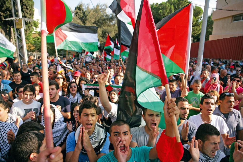 En 2014, les Palestiniens manifestent contre la guerre menée par Israël à Gaza. Une année noire pour le tourisme dans la région, où l'on craint les conséquences économiques de nouvelles tensions.