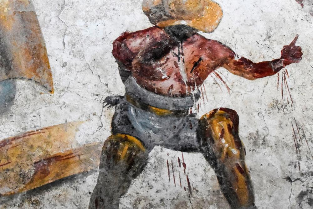 Bijzondere fresco van twee gladiatoren ontdekt in Pompeï