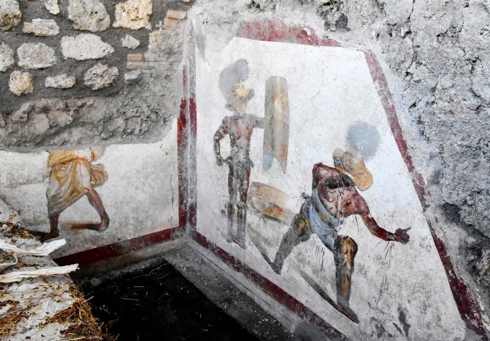 Bijzondere fresco van twee gladiatoren ontdekt in Pompeï