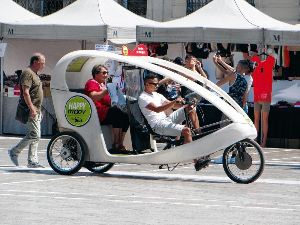 Happy en ville ou quand le vélo-taxi électrique a un triple avantage