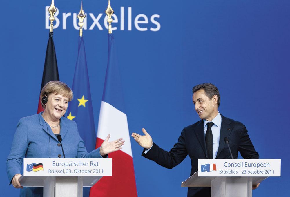 Merkel et Sarkozy : des sourires qui en disent long, le 23 octobre 2011.