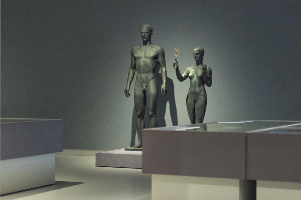 En 1936, les Jeux olympiques qui ont lieu à Berlin sont synonymes de vaste opération de propagande. L'occasion pour Arno Breker (1900 - 1991), artiste chéri du parti national-socialiste, de réaliser deux sculptures (Victorieuse, Décathlon).