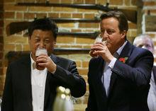 David Cameron et le Président chinois Xi Jinping.