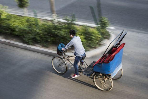  Li Wei dans les rues de Pékin.