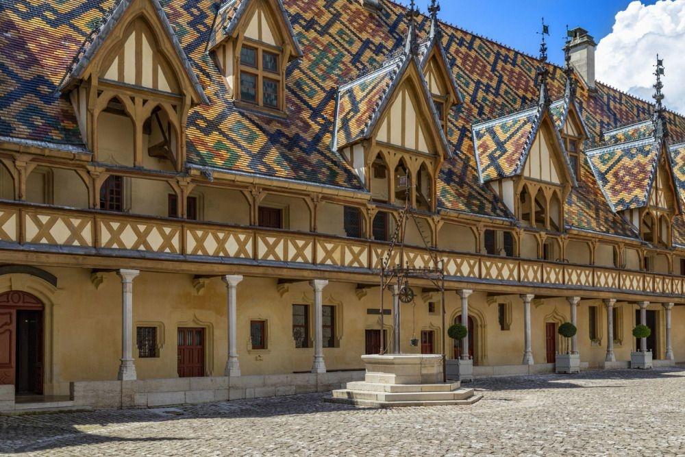 The Hospices de Beaune or Hotel-Dieu de Beaune, a medieval hospital in the town of Beaune in the Burgundy region of eastern France. Founded in 1443, it is a former charitable almshouse.