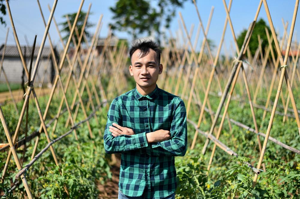 Ngo Xuan Quyet, 26 ans, un ancien vendeur de pesticides qui est passé à une agriculture 