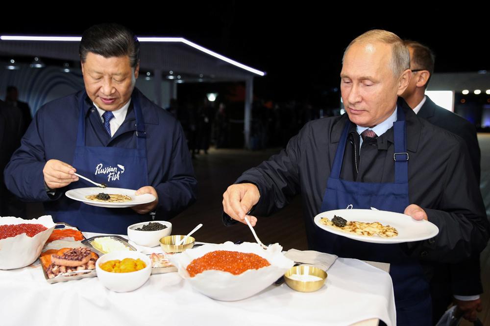 Xi Jinping et Vladimir Poutine, sur le point de passer à table