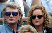 Johnny Hallyday et Laeticia dans le public de Roland Garros, au début de leur relation