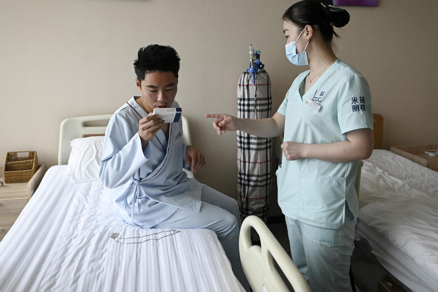 Xia Shurong, au réveil, après son opération