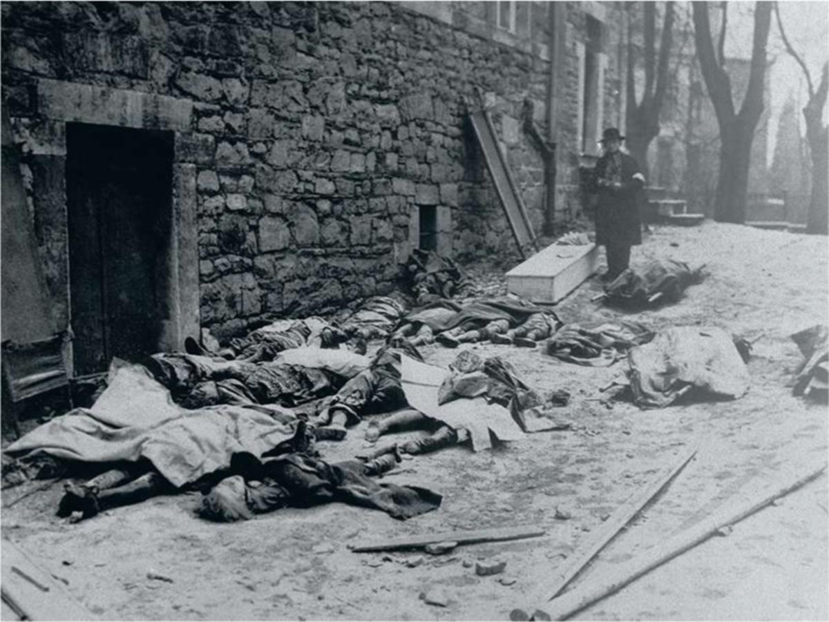 Des cadavres d'hommes, de femmes et d'enfants jonchent les rues et attendent d'être identifiés, à Malmedy.