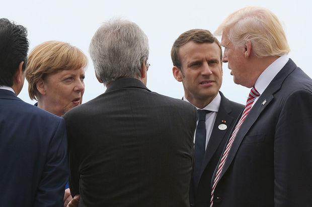 Angela Merkel, Emmanuel Macron, en Donald Trump