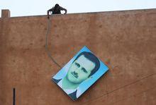 Lid van al-Nusra verwijdert foto van Syrische president Bashar al-Assad 