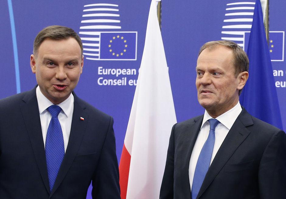 De Poolse president Andrzej Duda en zijn landgenoot en voorzitter van de Europese Raad Donald Tusk: tegenpolen.