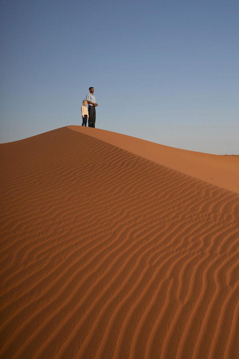 Zandduinen zover het oog reikt in de Namibwoestijn.