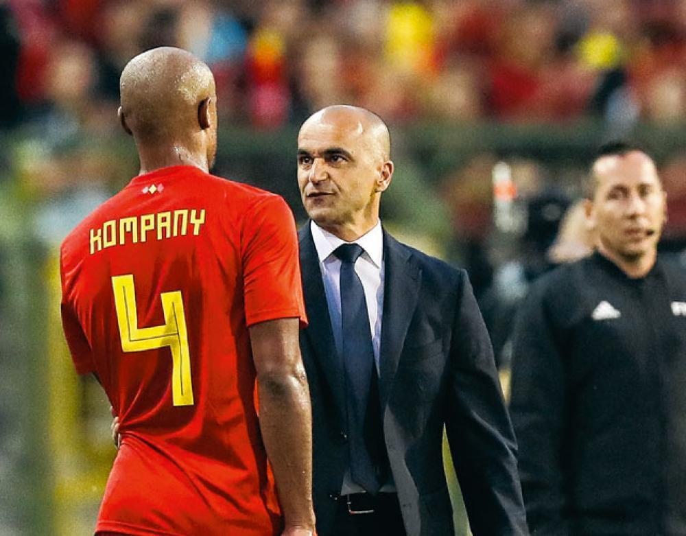 Roberto Martínez, hier met Vincent Kompany: 'Het succes is niet die halve finale, het is de manier waarop we voetbalden.'