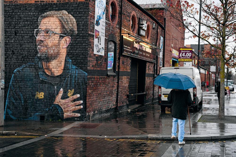 Een muurtekening van Jürgen Klopp in de straten van Liverpool toont de immense populariteit van de Duitse coach.