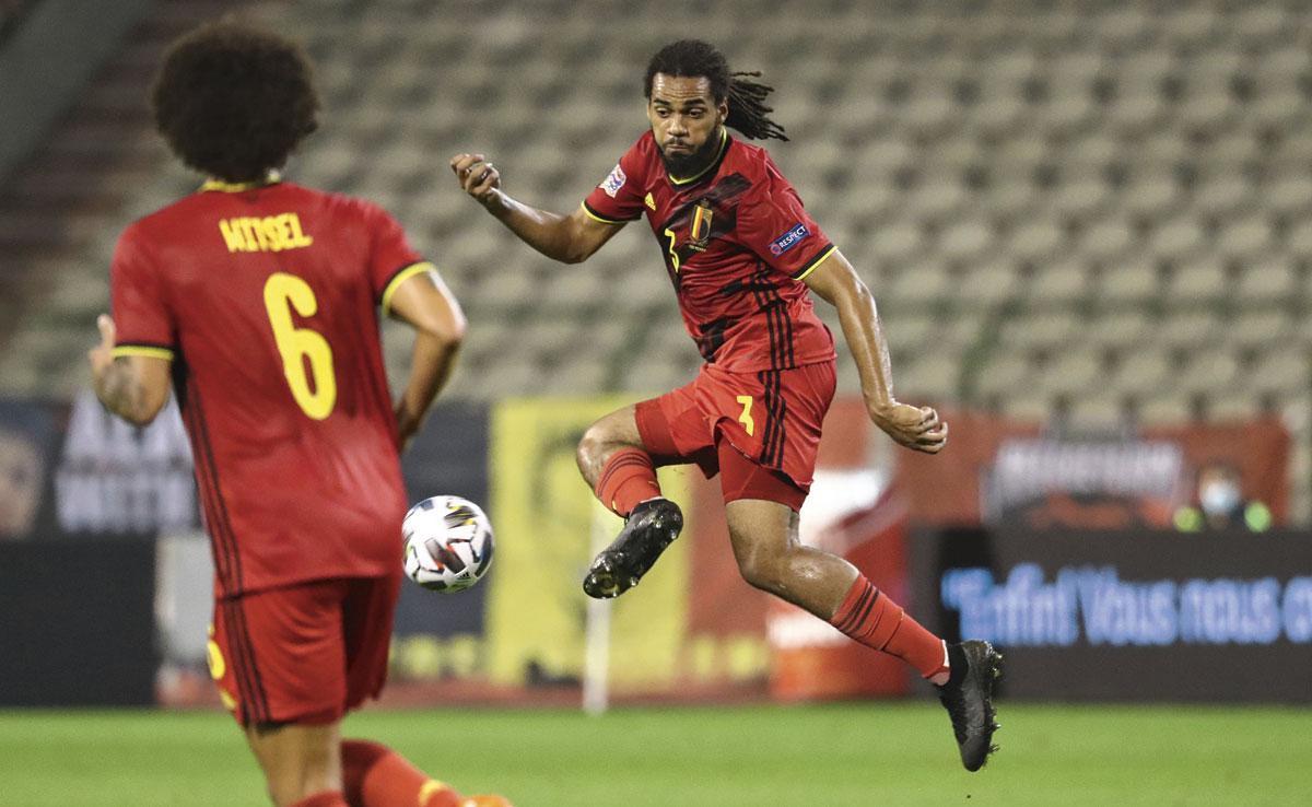 Jason Denayer, hier bij de Rode Duivels, is de trots van de Brusselse Anneessensstraat.