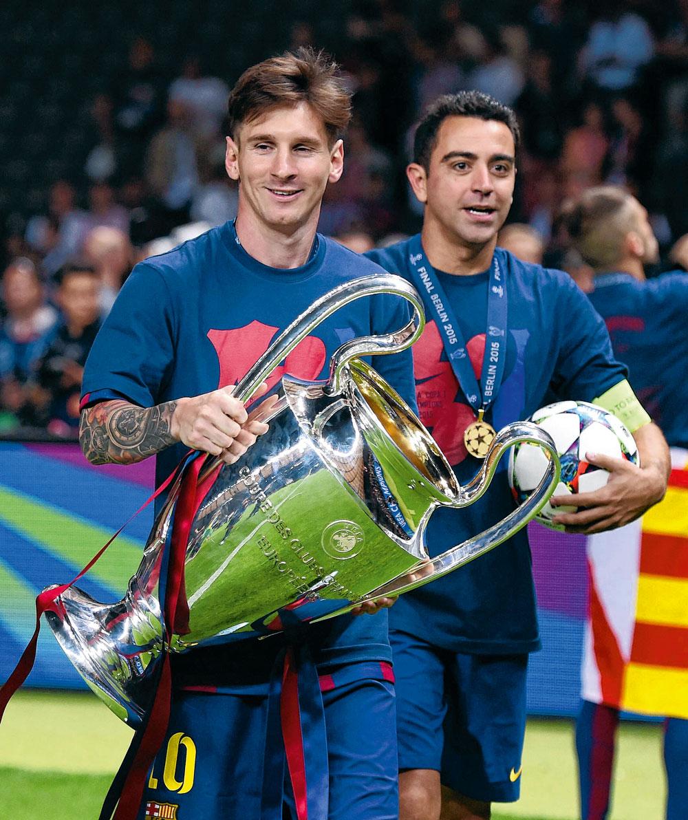 En compagnie de Messi après la victoire en Ligue des Champions face à la Juventus en 2015.