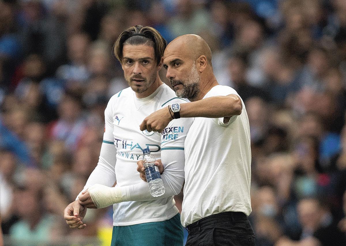 En grande discussion avec son coach actuel, Pep Guardiola.