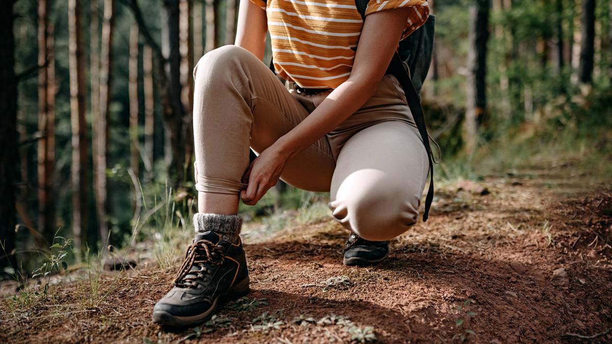 girl hiking in the woods hiking shoes