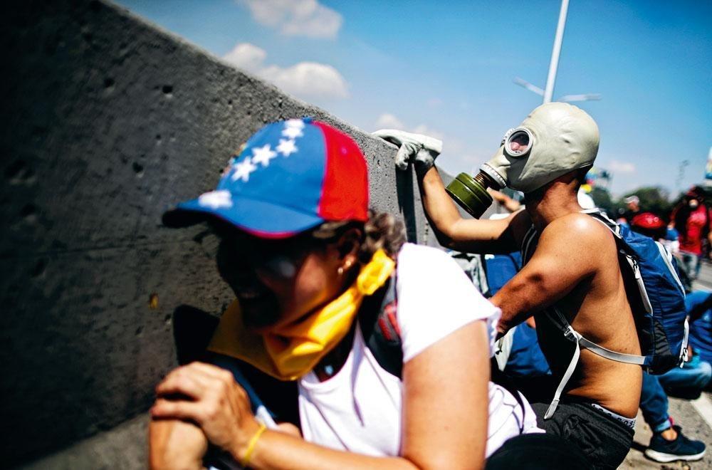 Verslag uit de Venezolaanse hel: bedrijven hopen op een mirakel