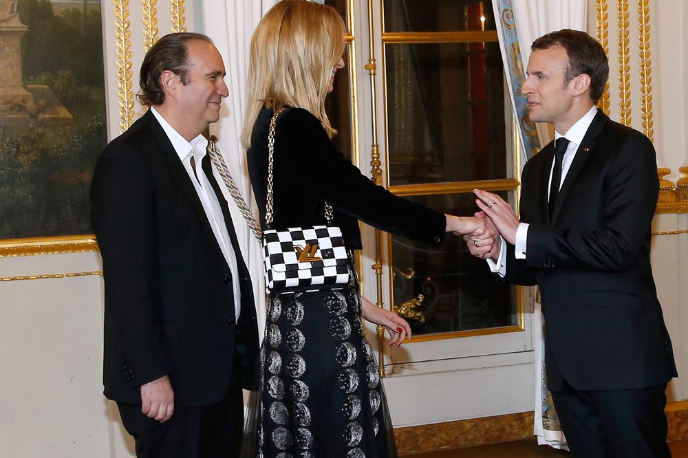 Xavier Niel et sa compagne, Delphine Arnault, fille de Bernard Arnault (LVMH) sont des proches du président Emmanuel Macron