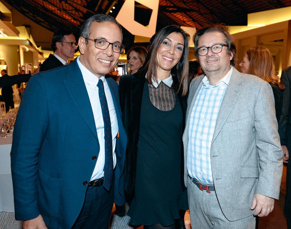 Amid Faljaoui, directeur de Trends-Tendances, et son épouse, en compagnie de l'homme d'affaires Marc Coucke.