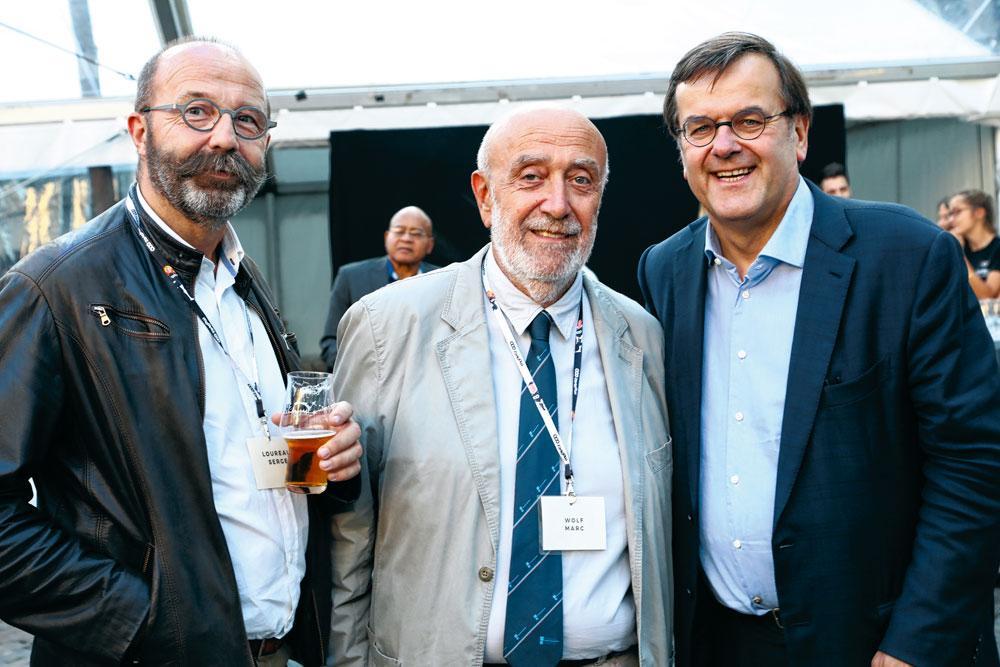 Serge Loureau, directeur du Musée des Transports en commun de Wallonie, Marc Wolf, coprésident de Liège Centre, et le bourgmestre de Liège, Willy Demeyer.
