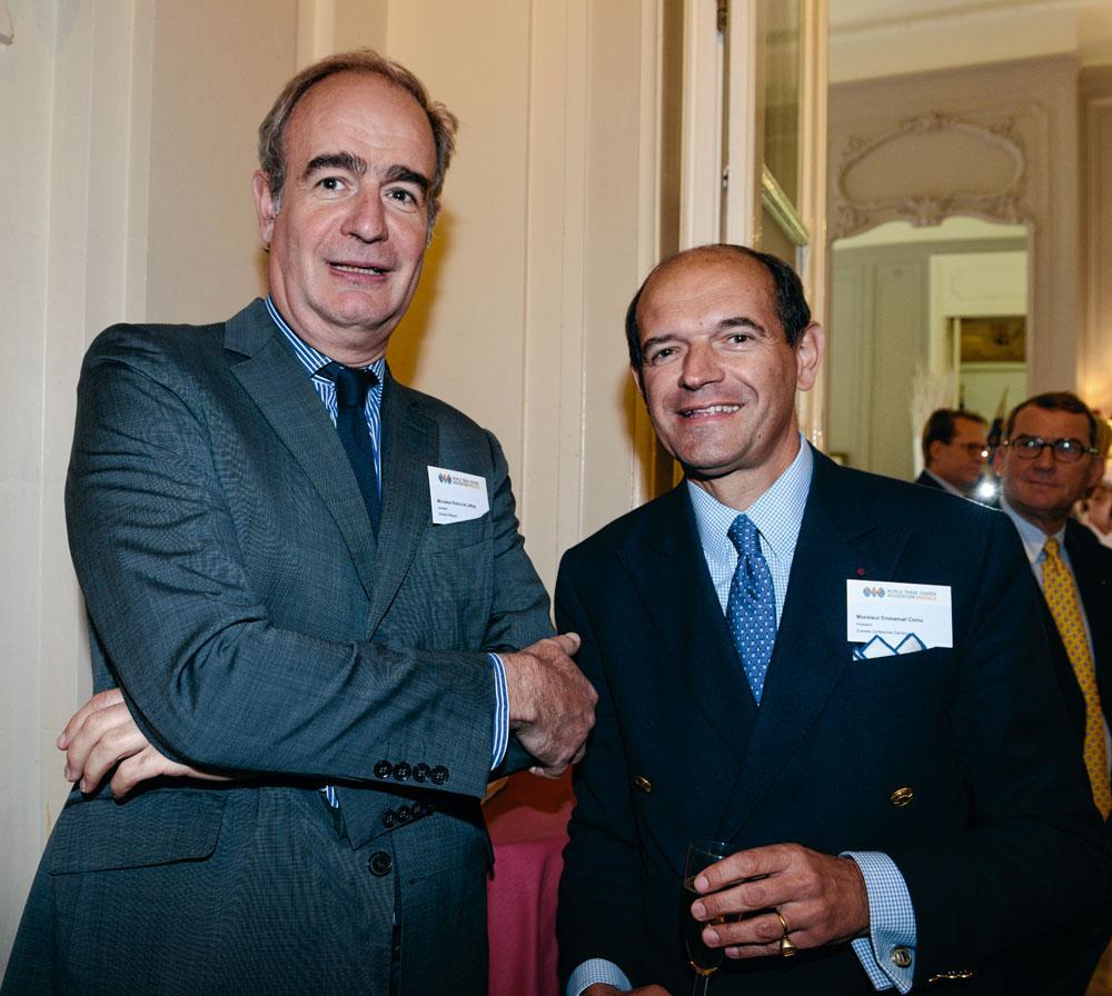 Roland de Lathuy, directeur du bureau de représentation de Christie's à Bruxelles, et l'avocat Emmanuel Cornu, président des Grandes Conférences catholiques.
