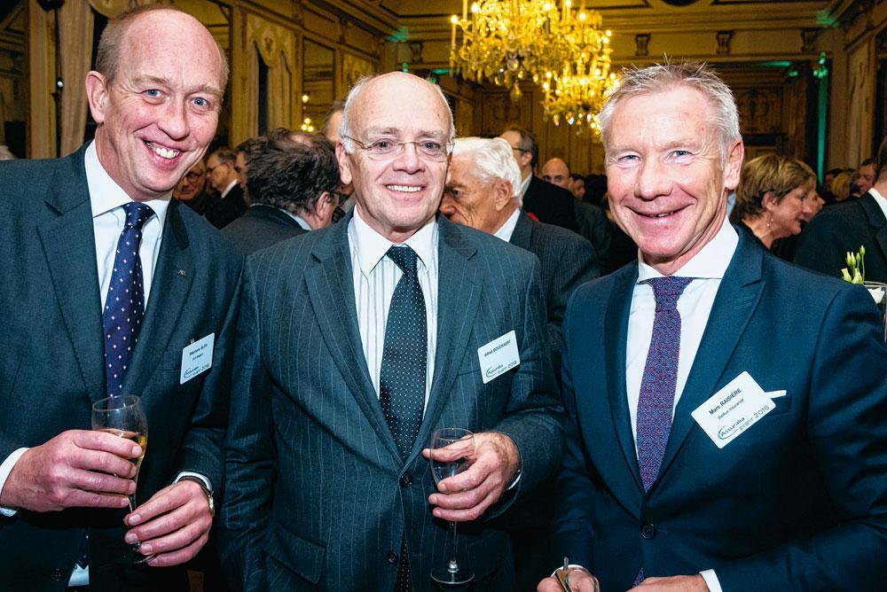 Stéphane Slits, CEO d'Axa Holdings Belgium, Alfred Bouckaert  et Marc Raisière, res- pectivement ancien président  et CEO  de Belfius.