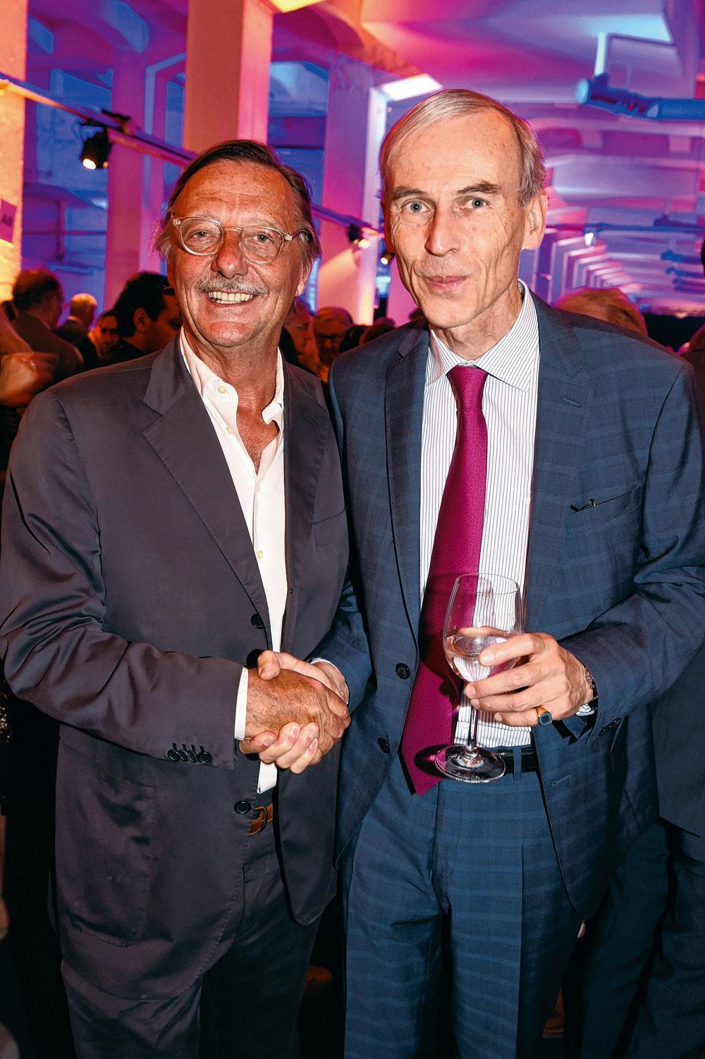 Alain Flausch, secrétaire honoraire de l'UITP, et Philippe Dehennin, président de la Febiac.