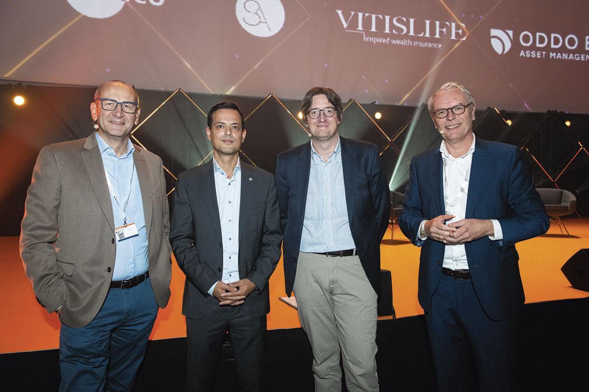 Marc Lauwers, CEO d'Argenta, Albert Verlinden, président de BZB-Fedafin, Bjorn Cumps, professeur à la Vlerick Business School, et Michel Lüttgens, directeur de P&V Group.