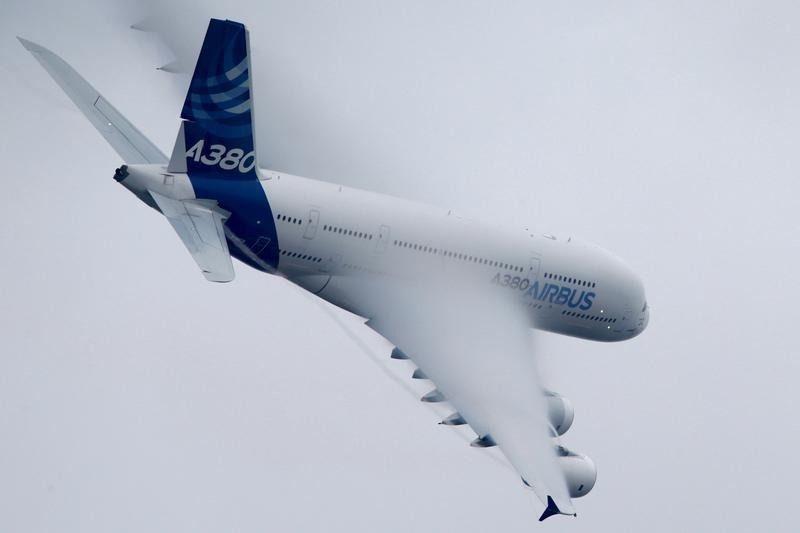An Airbus A380, the world's largest jetliner, generates vortex during a flying display at the 51st Paris Air Show at Le Bourget airport near Paris.