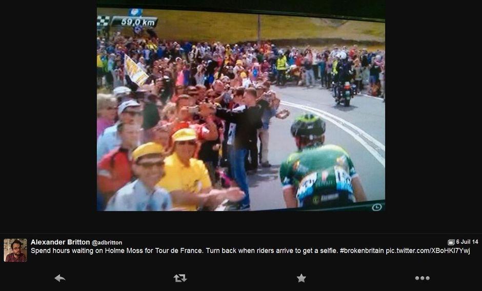 Spend hours waiting on Holme Moss for Tour de France. Turn back when riders arrive to get a selfie. #brokenbritain pic.twitter.com/XBoHKI7Ywj -- Alexander Britton (@adbritton) July 6, 2014