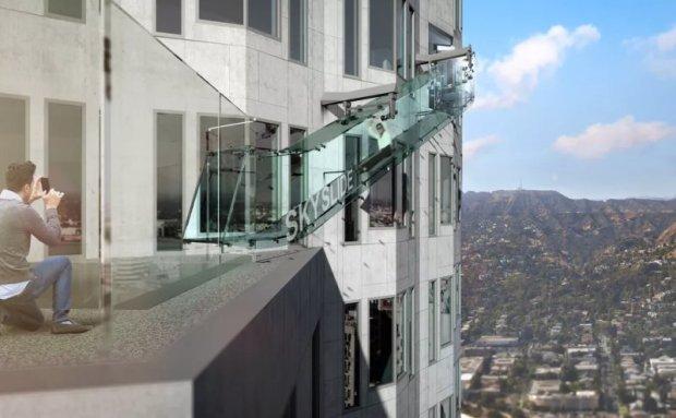 LOS ANGELES -- The downtown Los Angeles skyline is about to get a whole lot more exciting -- and possibly a little scary for anyone afraid of heights.  CBS Los Angeles reported the U.S. Bank Tower, the tallest building west of the Mississippi, is getting a scream-inducing new tourist attraction called Skyslide.  The 36-foot-long glass slide will allow thrill-seekers to slide from the 70th floor down to the 69th floor on the outside of the building.    The slide is about 1,000 feet above ground and will give sliders quite the view down. A new observation deck and upscale restaurant are being added on the 71st floor, offering views from the hills of Glendale to Catalina.  Organizers expect tickets to run about $25 for the slide and observation deck once the attraction opens by the middle of this year.