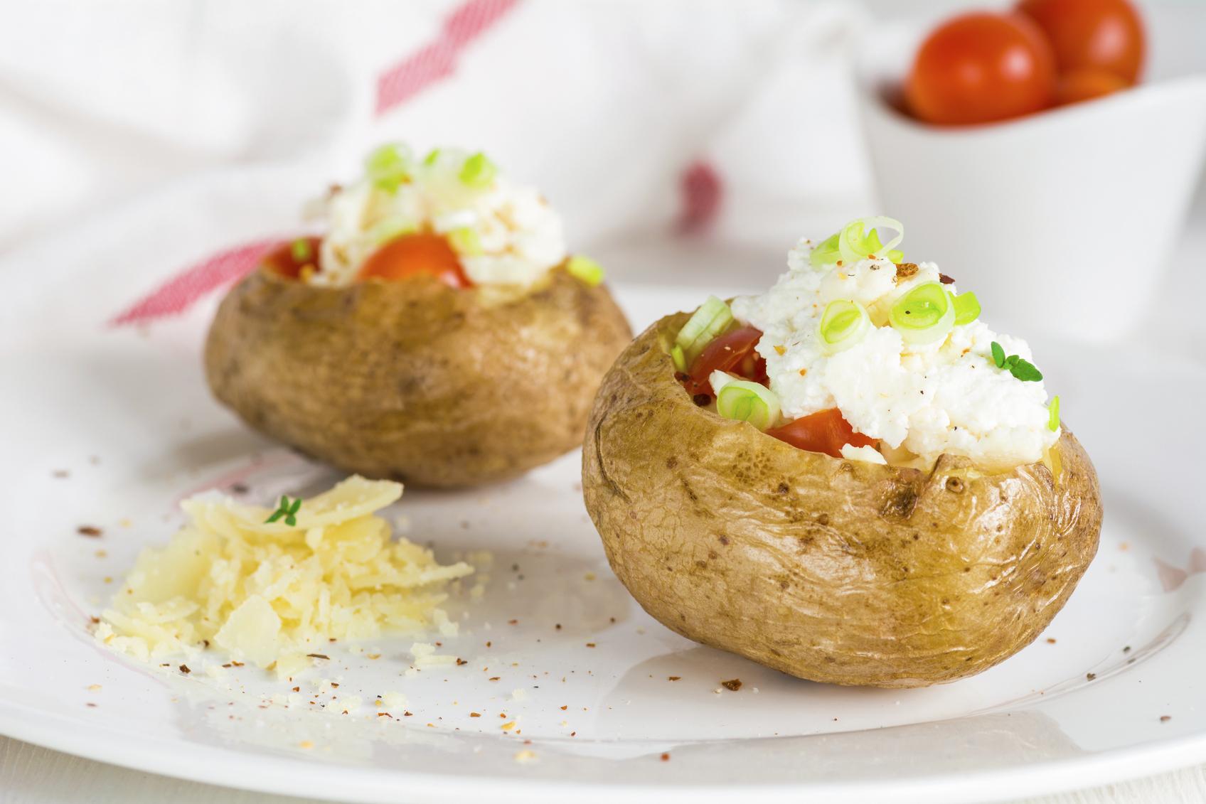 Baked potato with bacon, cheese and sour cream