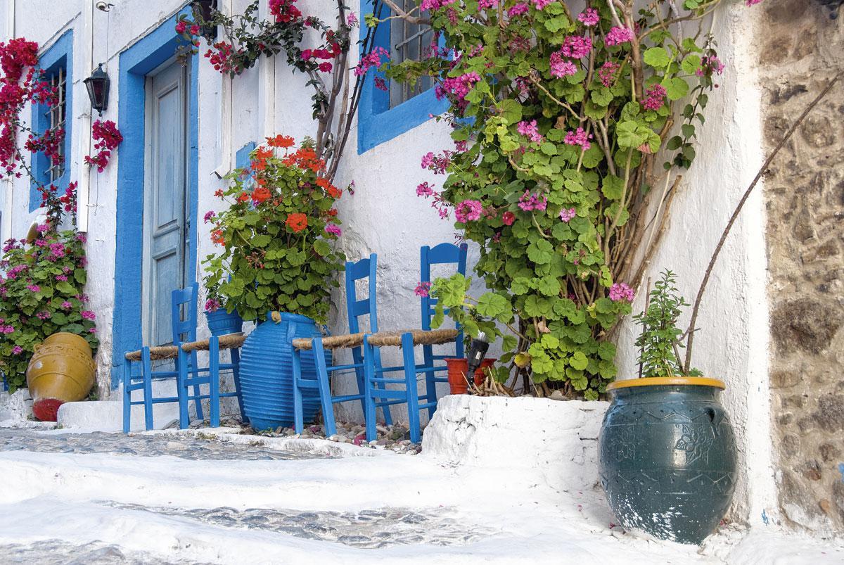 Typische wit-blauwe huisjes in de Griekse dorpen
