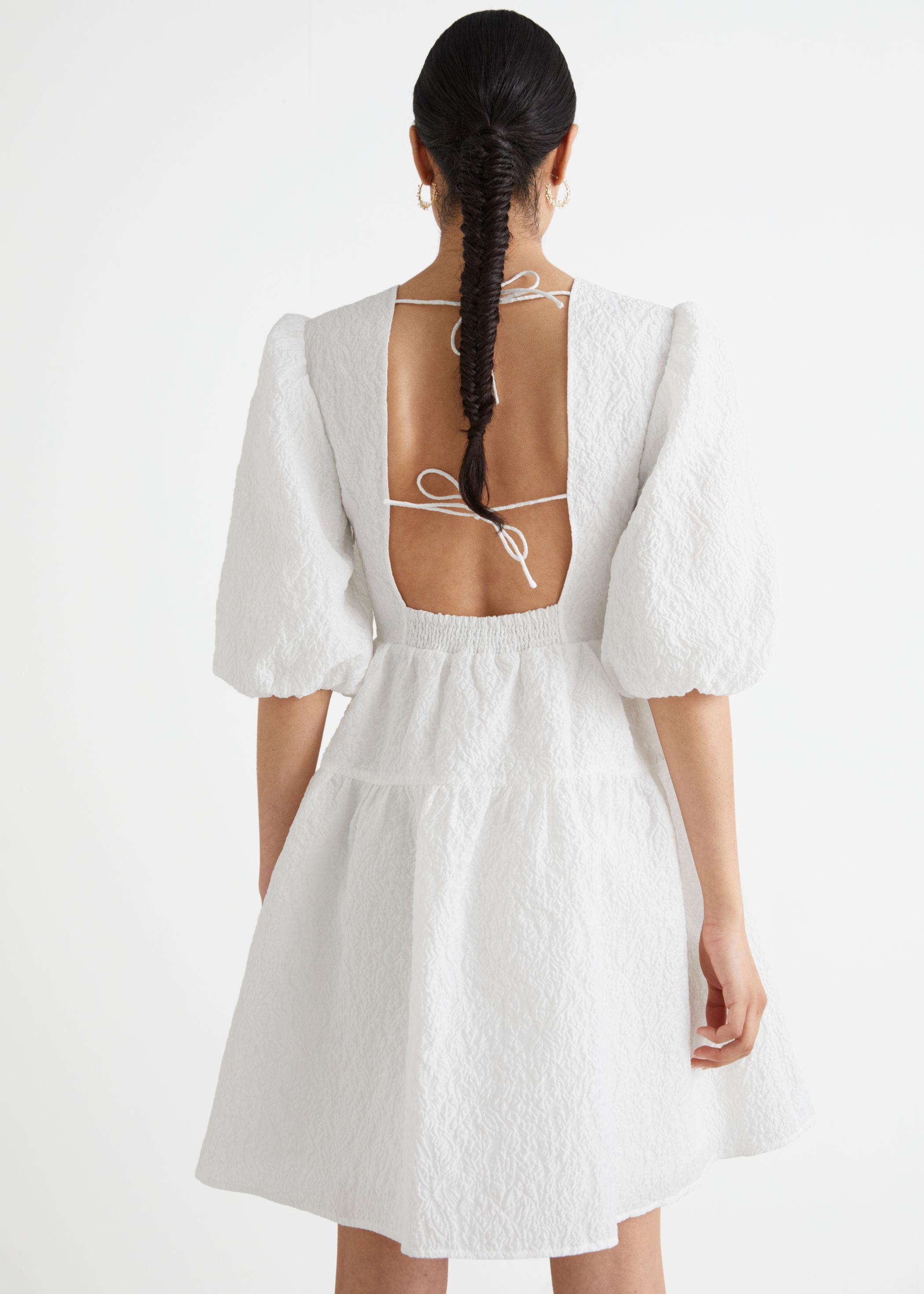 Jacquard cocktailjurk met pofmouwen
