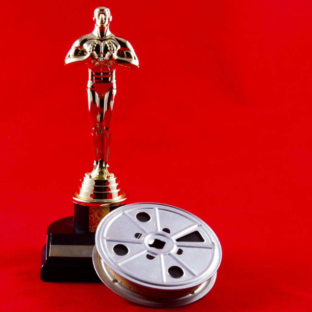 Oscar Statuette with Movie Reel